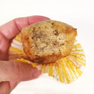 Muffin in hand with bite taken out