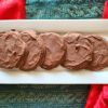 Giant Thin Mint Cookies on white plate with green and red fabric behind