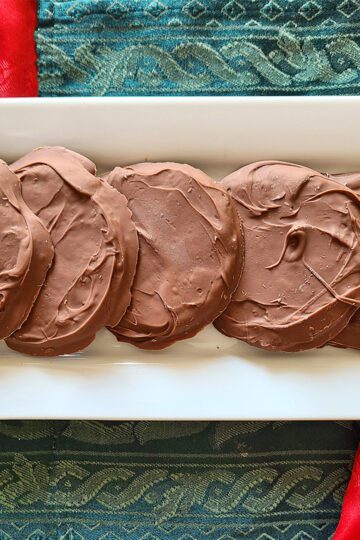 Giant Thin Mint Cookies on white plate with green and red fabric behind