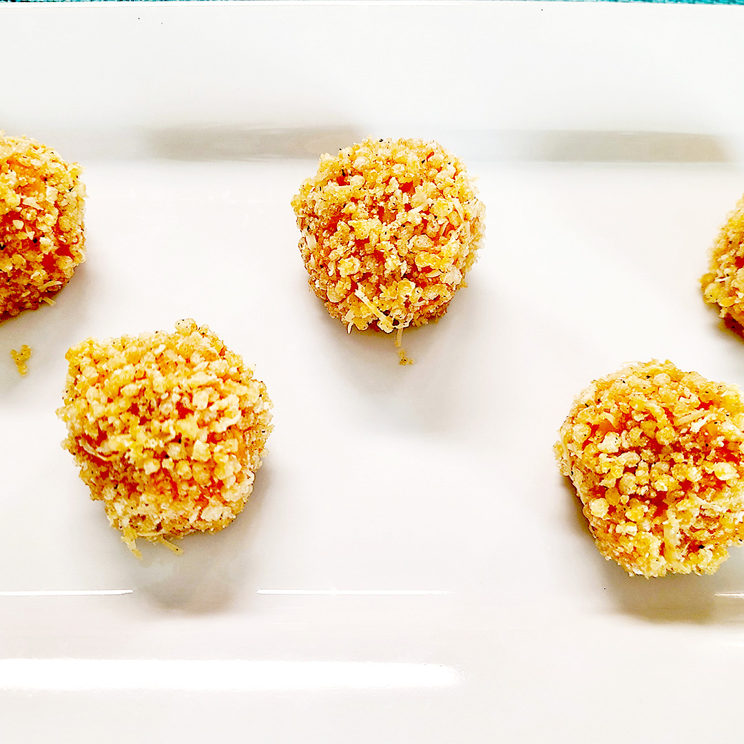 savory sweet potato balls on white platter