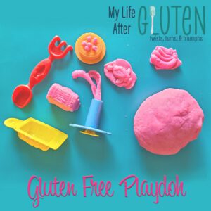 pink gluten free playdoh with accessories on a teal background