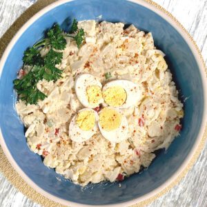 potato salad in a large blue bowl