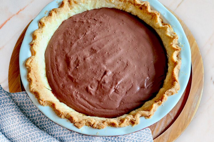 gluten free chocolate pie with homemade crust in pie pan
