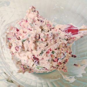 Cranberry Almond Cheeseball Bites filling in a glass bowl