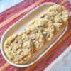 gluten free chocolate chip oatmeal cookies on a white oval plate