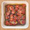 Lemon Herb Baked Chicken in a white square dish