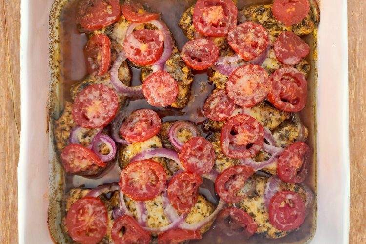 Lemon Herb Baked Chicken in a white square dish