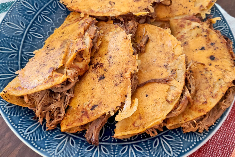 Birria Tacos on a blue plate