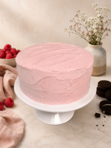A 3 Layer gluten free chocolate cake with Oreo butter cream on the inside and raspberry buttercream on the outside